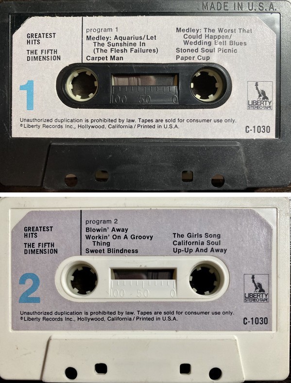 cassette tape of The Fifth Dimension's "Greatest Hits" with one side black, the other white